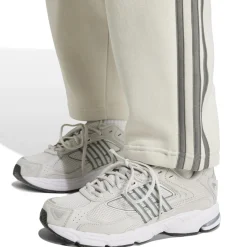 Discount Pantaloni joggers da donna bianchi con logo Donna Abbigliamento Adidas|Gonne E Pantaloni